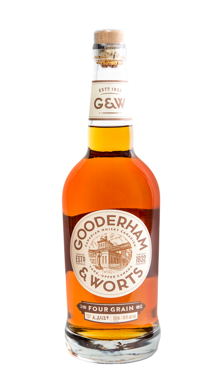 Gooderham & Worts Canadian Whisky 750ml bottle featuring a clear glass bottle with a wooden cap and a dark label accented with copper and cream tones. The label highlights the four-grain blend and the historic Gooderham & Worts branding. The whisky inside has a golden amber hue. A premium Canadian whisky crafted in Ontario, offering flavours of green apple and toasted grains, inspired by one of the world’s most historic distilleries.