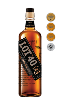 Lot No. 40 Dark Oak Canadian Whisky 750ml bottle on a white background, featuring a clear glass bottle with a wooden cap and a bold black and copper-accented label. The label highlights the 100% rye grain and double maturation in new American oak barrels, including a second finish in heavily charred oak. The whisky inside has a deep amber hue. A bold Canadian rye whisky crafted in Ontario, offering intense spice and dried fruit notes with a 48% ABV—ideal for sipping neat or in classic cocktails.