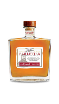 J.P. Wiser’s Red Letter 2025 Edition Canadian Whisky 750ml bottle on a white background, featuring an elegant clear glass bottle with a wooden cap and a premium cream and red-accented label. The label highlights the 20-year aging and Red Letter branding. The whisky inside has a deep amber hue. A limited-edition Canadian whisky crafted in Ontario, aged in new oak barrels with notes of green apple, vanilla, toffee, clove, and dark chocolate—an homage to founder John Philip Wiser.