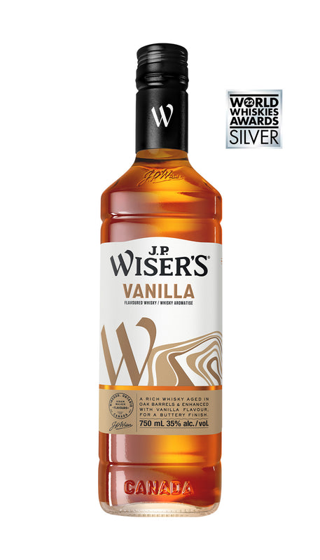 J.P. Wiser’s Vanilla Canadian Whisky 750ml bottle on a white background, featuring a clear glass design with a black cap and a cream and gold-accented label. The label highlights the vanilla flavour and Canadian whisky branding. The whisky inside has a warm amber tone. A smooth, flavoured Canadian whisky crafted in Ontario with natural vanilla, caramel, and toasted grain notes, made without artificial sweeteners.